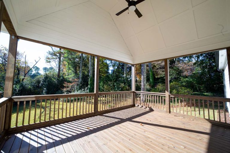 Large covered deck with ceiling fan