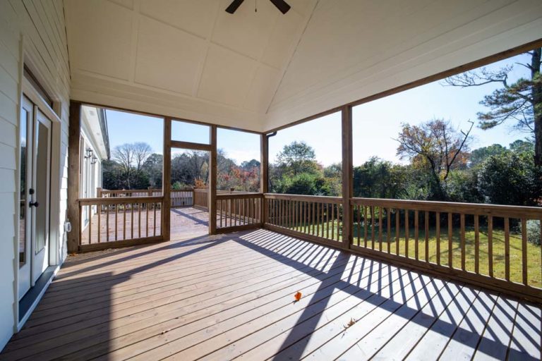 Large covered deck with ceiling fan